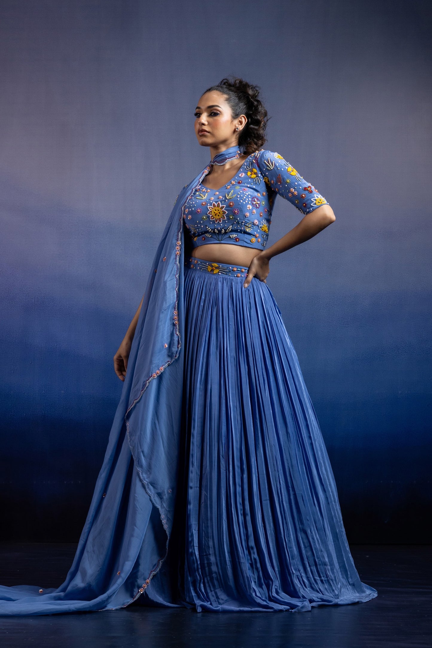Blue Crepe Pleated Lehenga — Multicolour Beadwork Blouse with Scalloped Organza Dupatta
