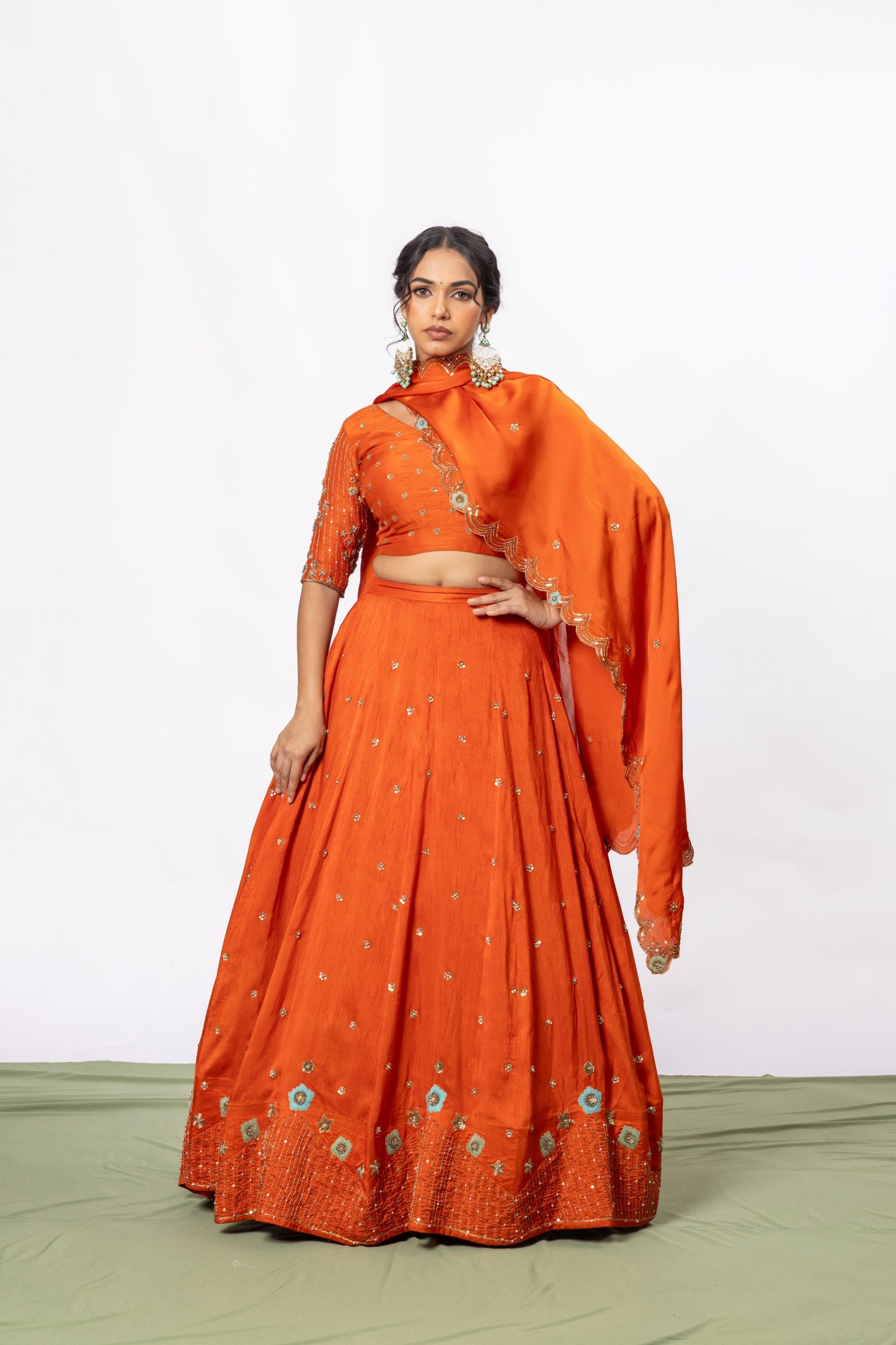 Sitarah Rust Orange Silk Kalidar Lehenga Set — Hand Aari Work with Turquoise Thread Flowers