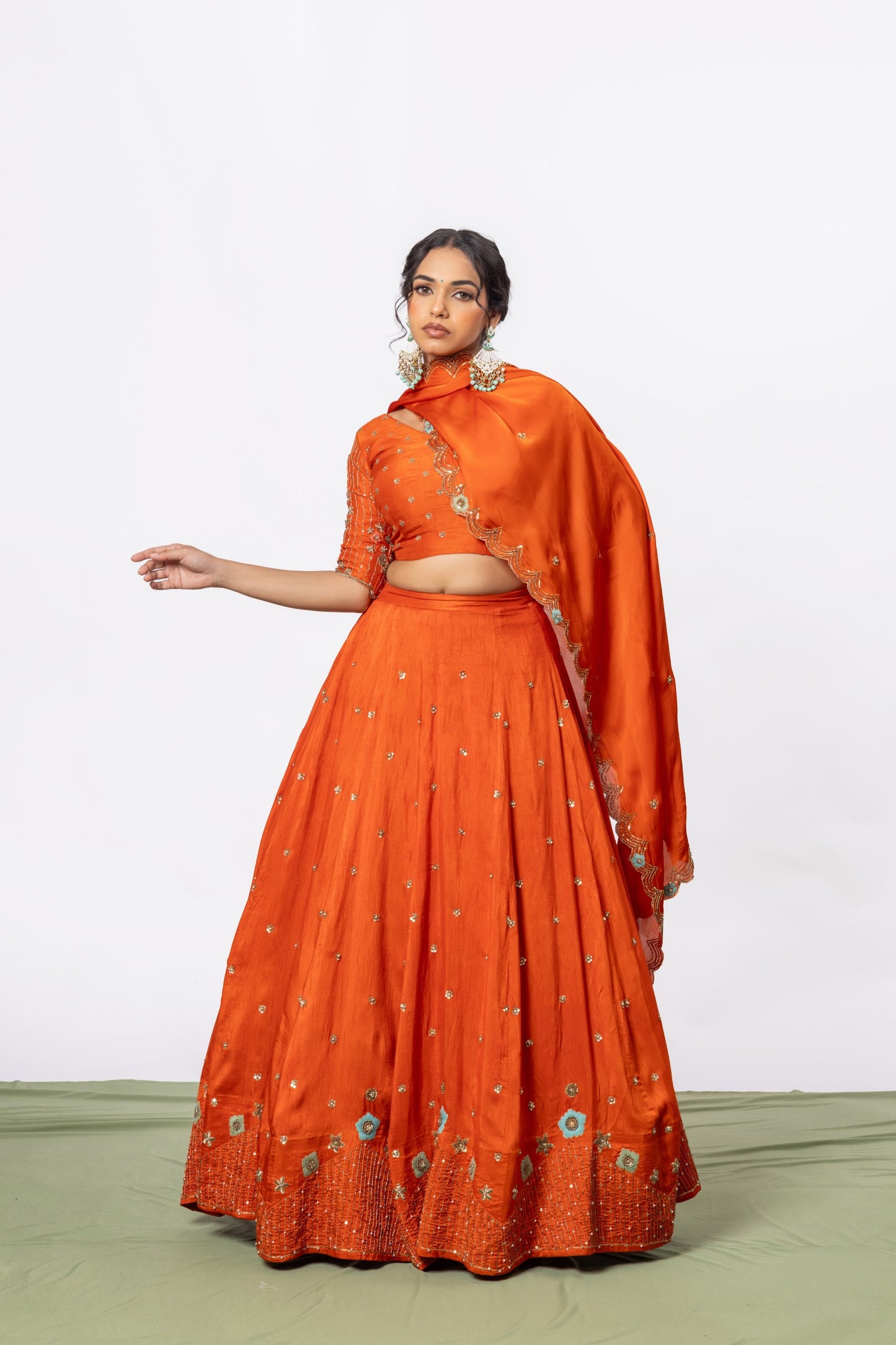 Sitarah Rust Orange Silk Kalidar Lehenga Set — Hand Aari Work with Turquoise Thread Flowers