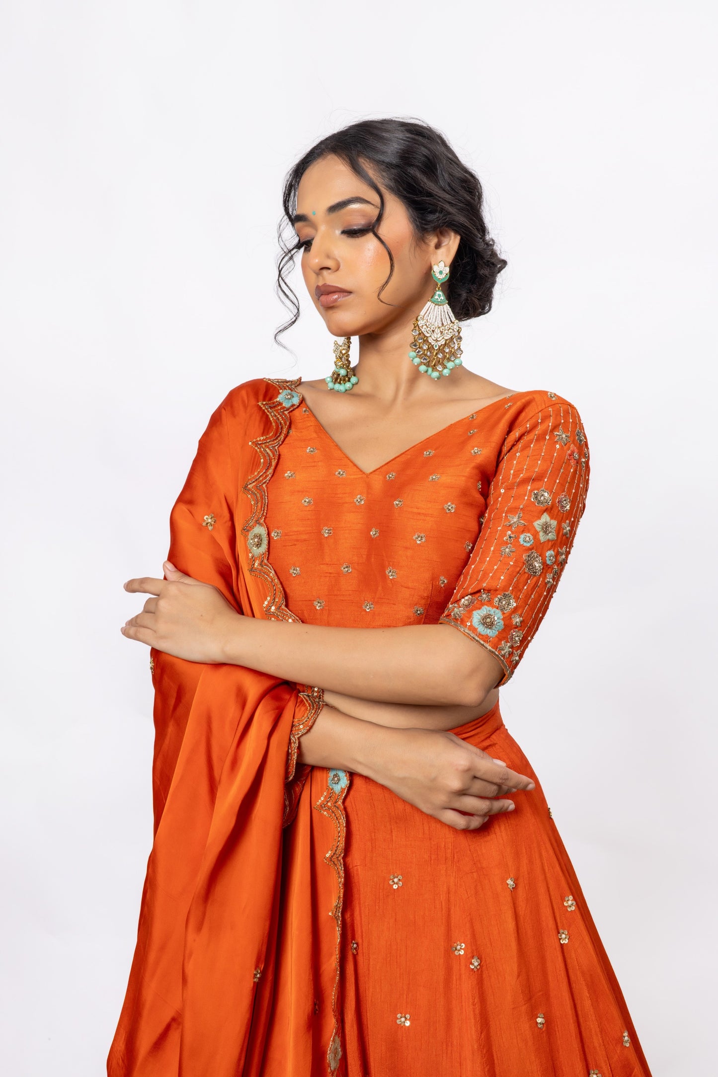 Sitarah Rust Orange Silk Kalidar Lehenga Set — Hand Aari Work with Turquoise Thread Flowers